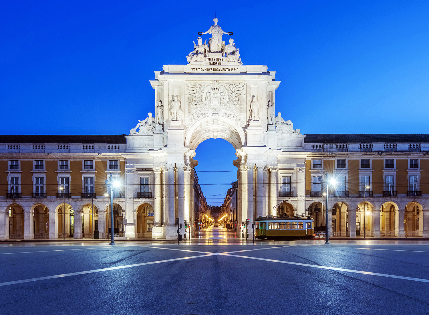 Illuminated ornate archway in Commerce Square, Lisbon, Lisbon, Portugal