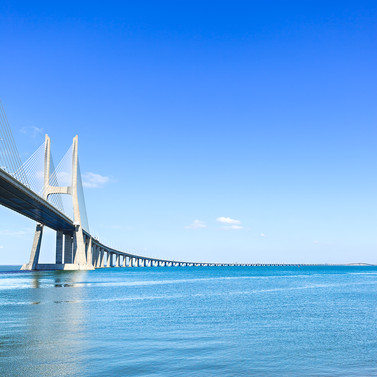 Vasco da Gama bridge on Tagus River in Lisbon, Portugal. It is the longest bridge in Europe