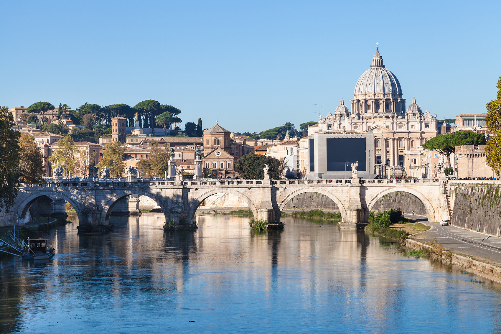 travel to Italy - Rome and Vatican city skyline with Basilica St. Peter's, Tiber river, Ponte Sant' Angelo (Bridge of Holy Angel) in autumn morning